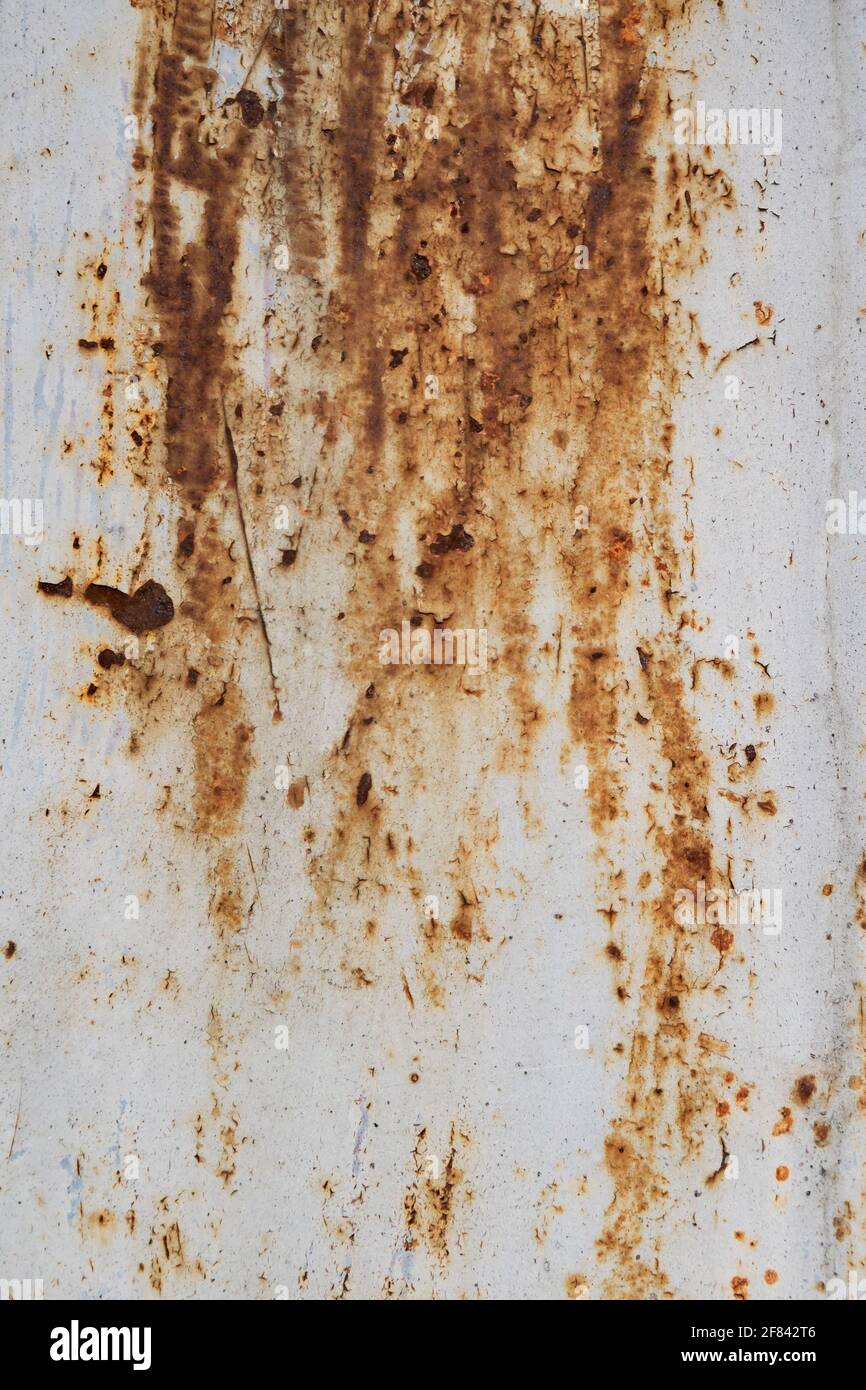 Old rusty aged white grunge metal surface texture background Stock Photo