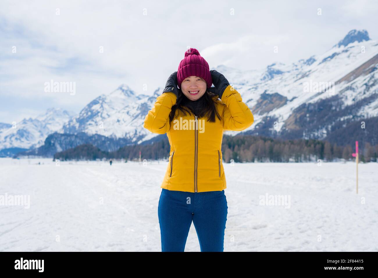Winter holidays in the snow lifestyle portrait of young happy and