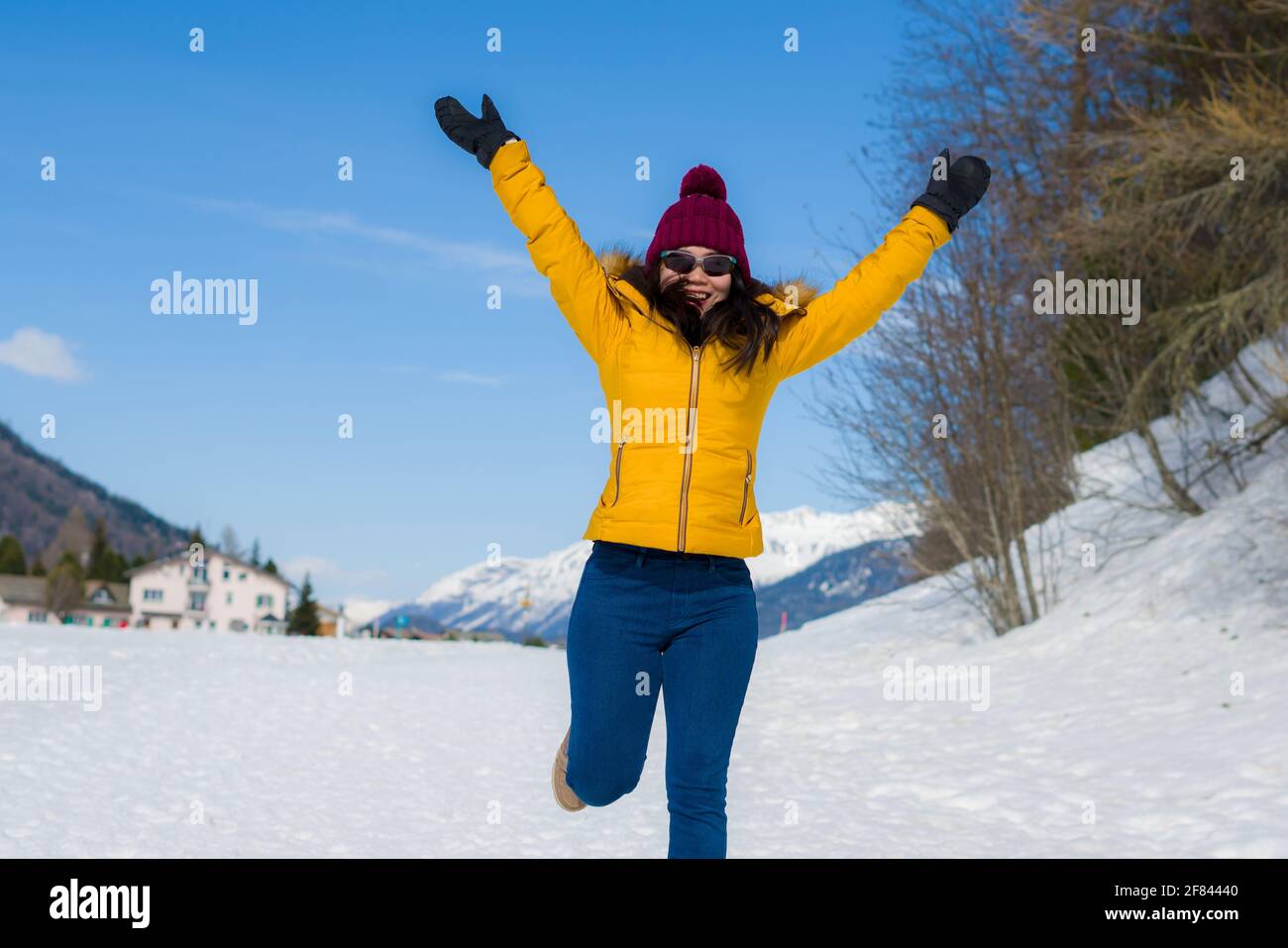 Winter holidays in the snow lifestyle portrait of young happy and