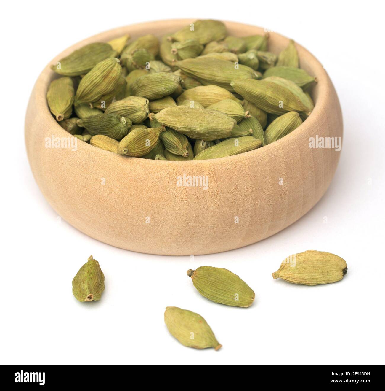 Cardamom seeds in wooden bowl Stock Photo Alamy
