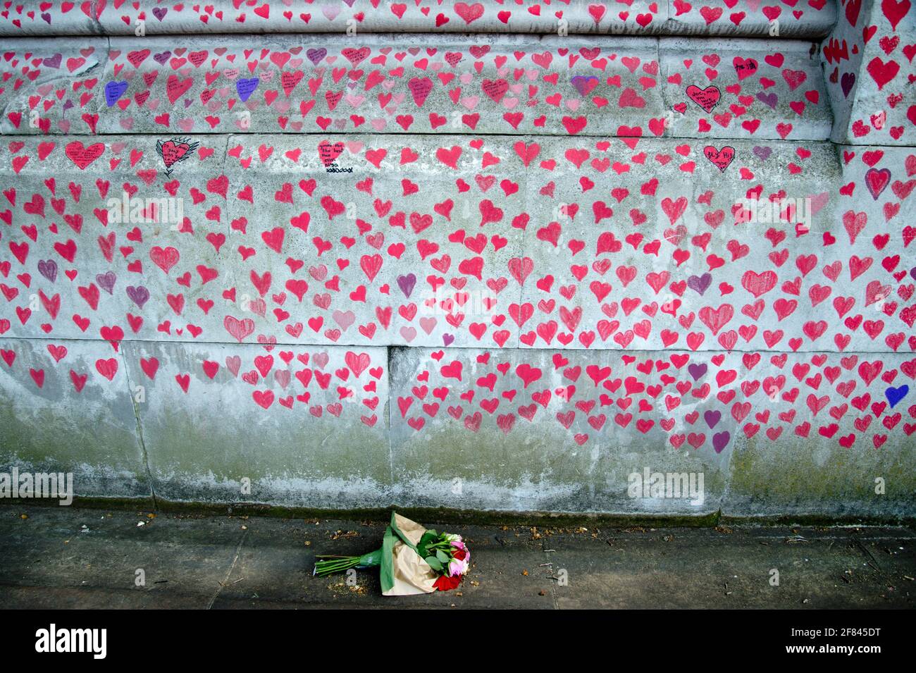 Southbank, London, England, UK. National Covid Memorial Wall. Red hearts to commerate those who died of Covid. Stock Photo