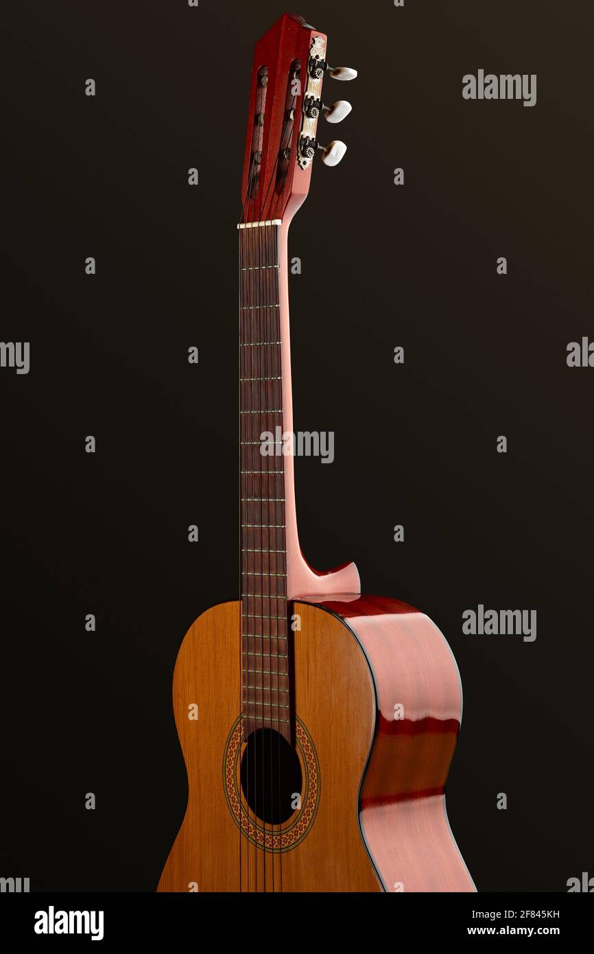 Musical instrument - View very rare vintage acoustic guitar folk country  wood and white background Stock Photo - Alamy