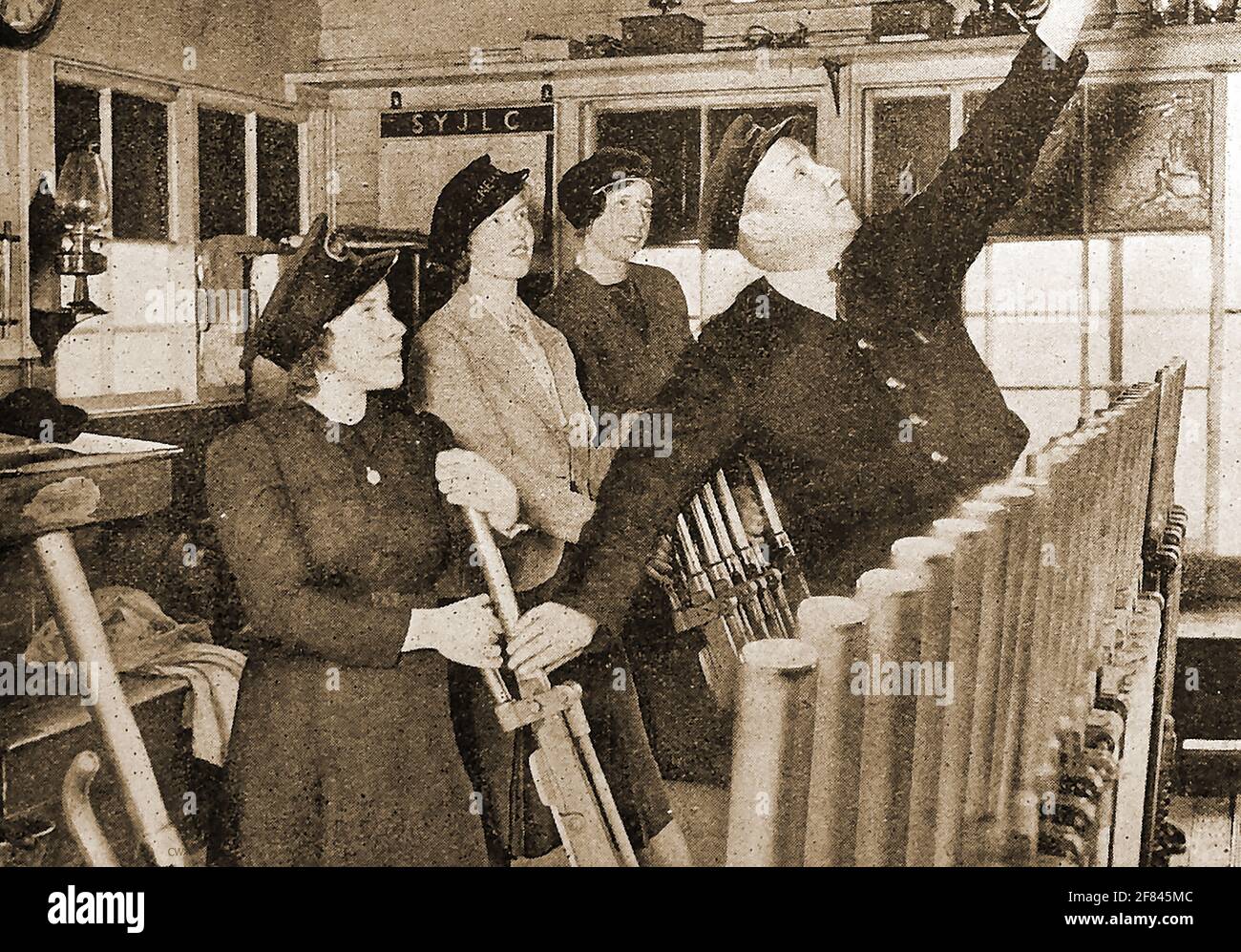WW2 - Women at work in Britain in 1941 -  A press photo of the time showing women training to be railway signal box operators. Stock Photo