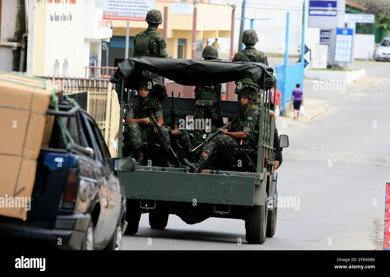 salvador, bahia / brazil  - april 23, 2014: Army military patrols in Salvador's Sussuarana neighborhood during military police strike. *** Local Capti Stock Photo