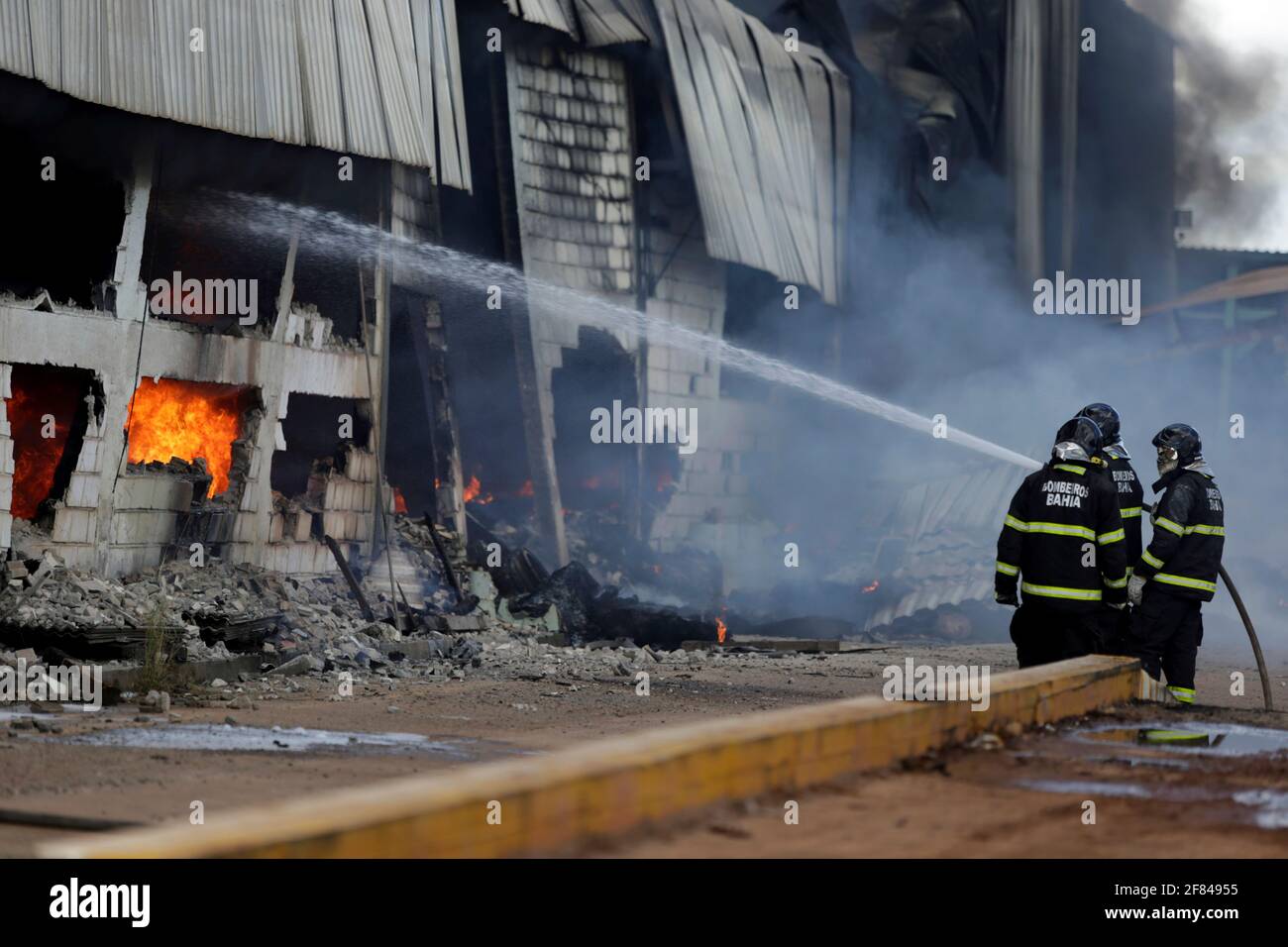 sao sebastiao do passe, bahia / brazil - may 31, 2019: Firefighters fire fighting at tire recycling factory in the city of Sao Sebastiao do Passe. *** Stock Photo