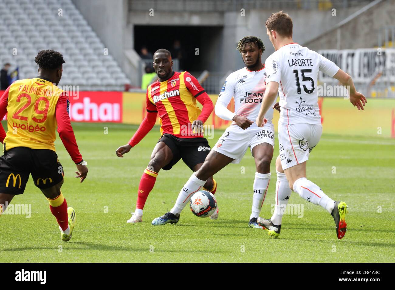 Lens, France. 11th Apr, 2021. Duel Haidara 21 Lens and Gravillon 2 Lorient  during the French championship Ligue 1 football match between RC Lens and  FC Lorient on April 11, 2021 at