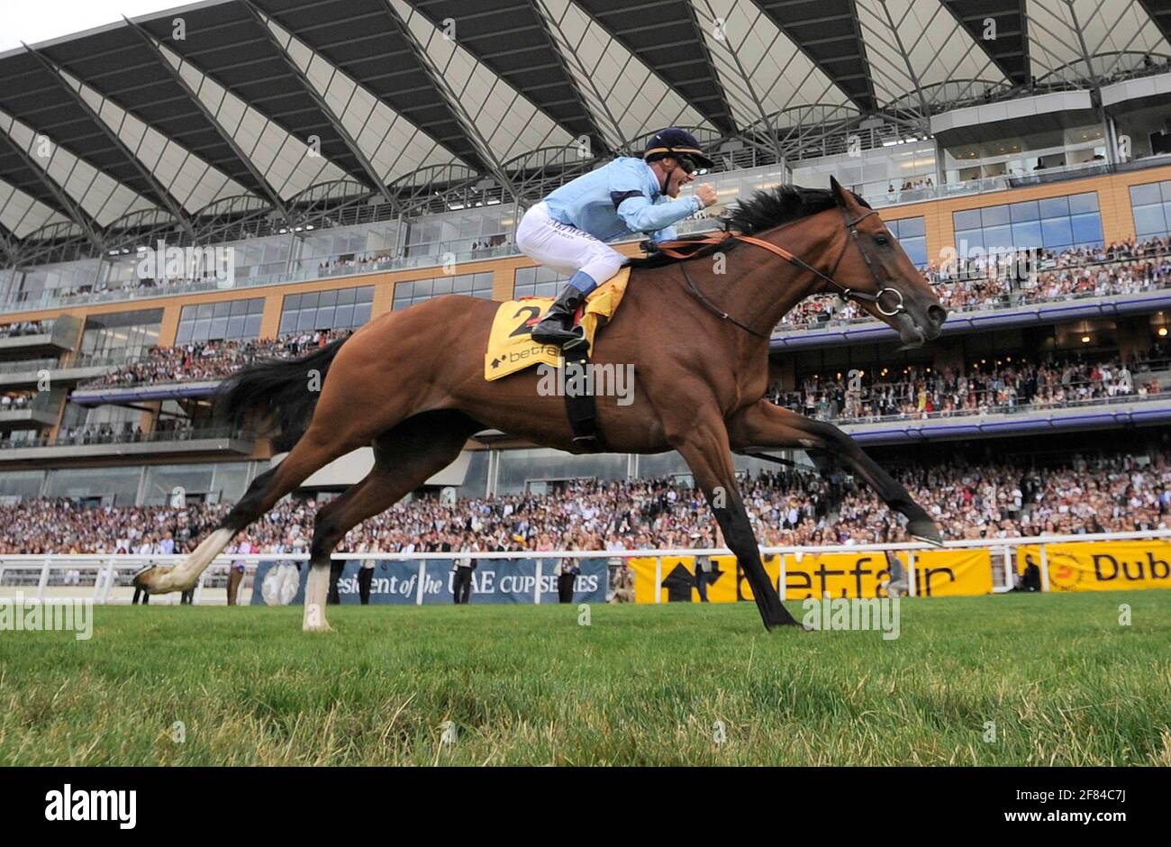 OLIVIER PESLIER ON HARBINGER WINS THE KING GEORGE V1 & QUEEN ELIZABETH STAKES. 23/7/10. PICTURE DAVID ASHDOWN Stock Photo