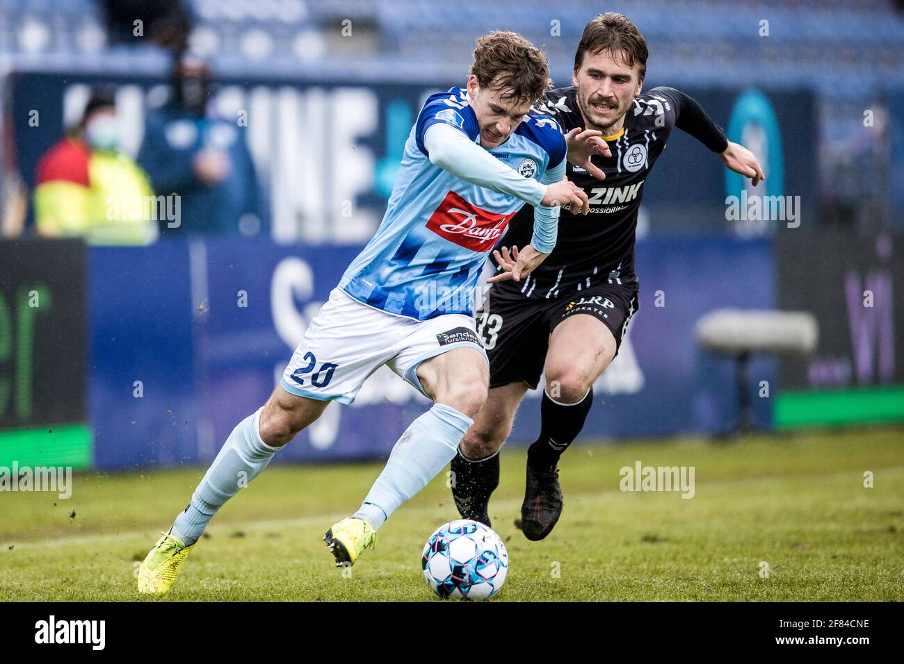 Haderslev, Denmark. 11th Apr, 2021. Peter Christiansen (20) of Soenderjyske  and Alexander Ludwig (33) of AC Horsens seen during the 3F Superliga match  between Soenderjyske and AC Horsens at Sydbank Park in