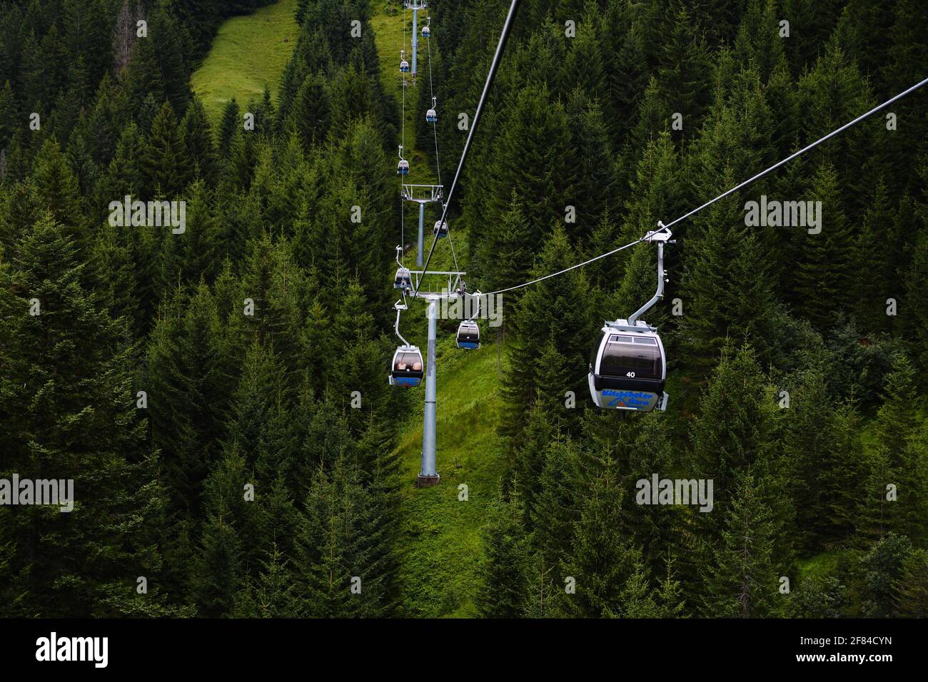 Cable car transportation  to Kitzbuhel Horn Alpine Road, spectacular twisting road leading onto the Kitzbuhel Horn mountain, Tirol, Austria Stock Photo