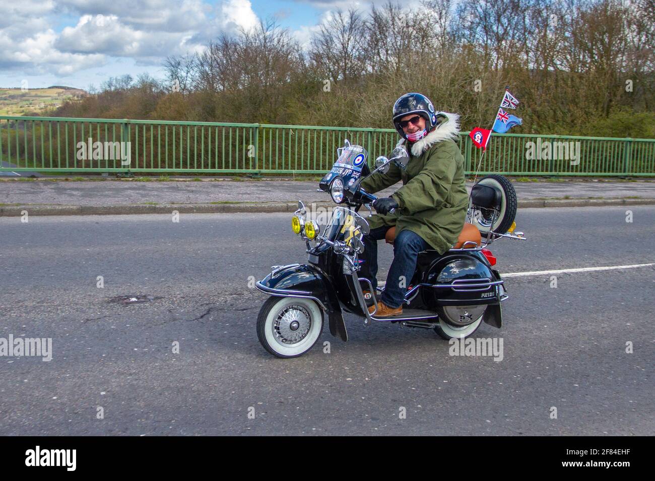 2006 Piaggio Px 125 Vespa 123cc scooter; Motorbike rider; two wheeled  transport, motorcycles, vehicle on British roads, motorbikes, motorcycle  bike riders motoring in Manchester, UK Stock Photo - Alamy