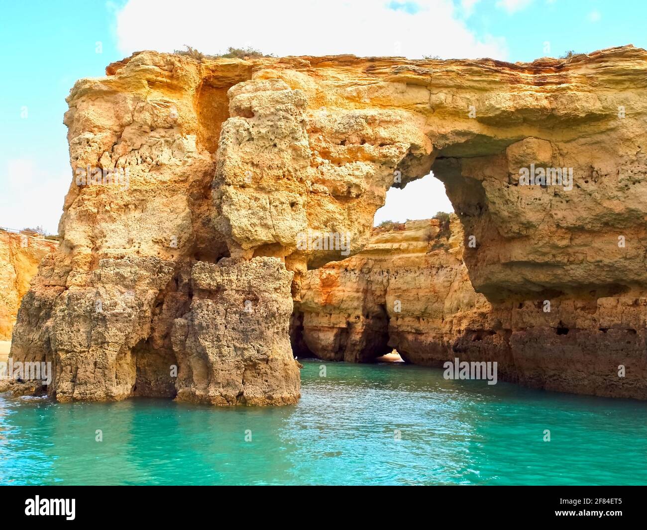 Beautiful grotto or cave seen on a boat trip from Albufeira to Bengadil at the Algarve coast of Portugal Stock Photo