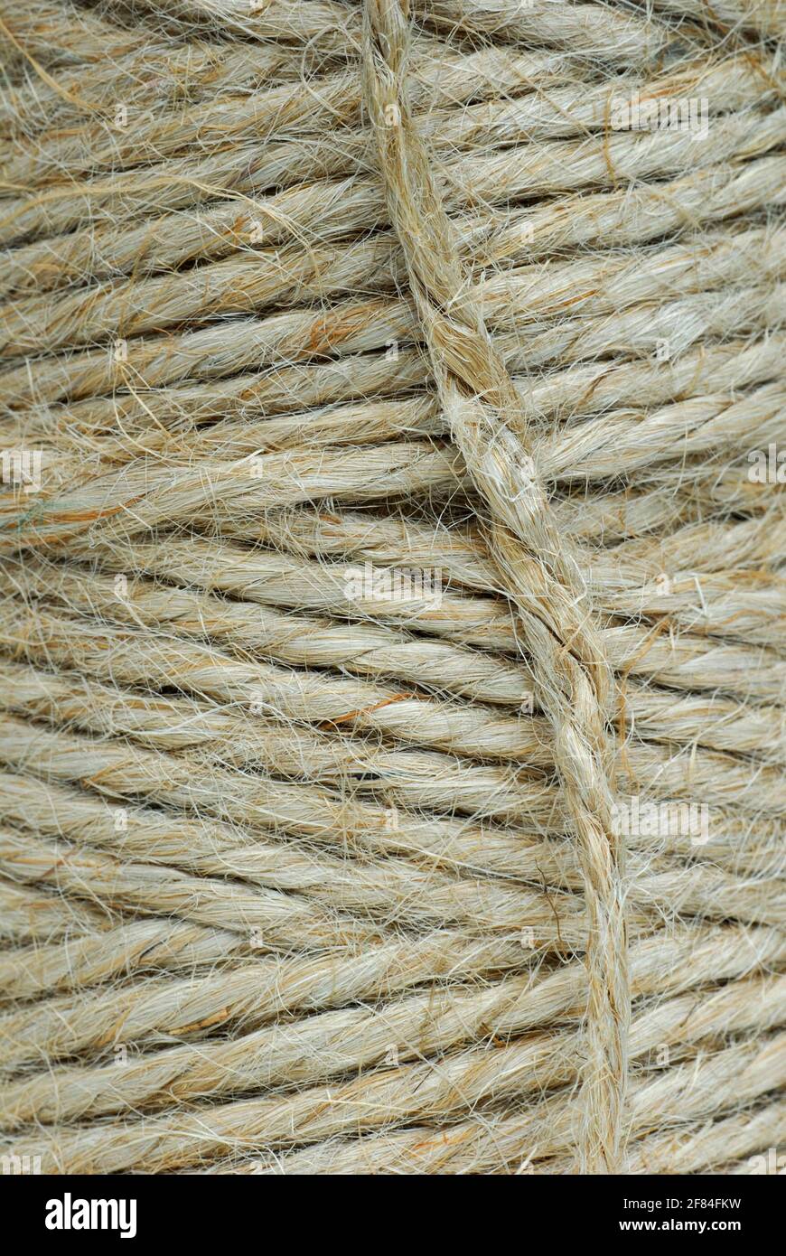 Roll of jute string, jute thread, jute fibre, bast fibre, natural fibre, yarn, cord, plant fibre Stock Photo