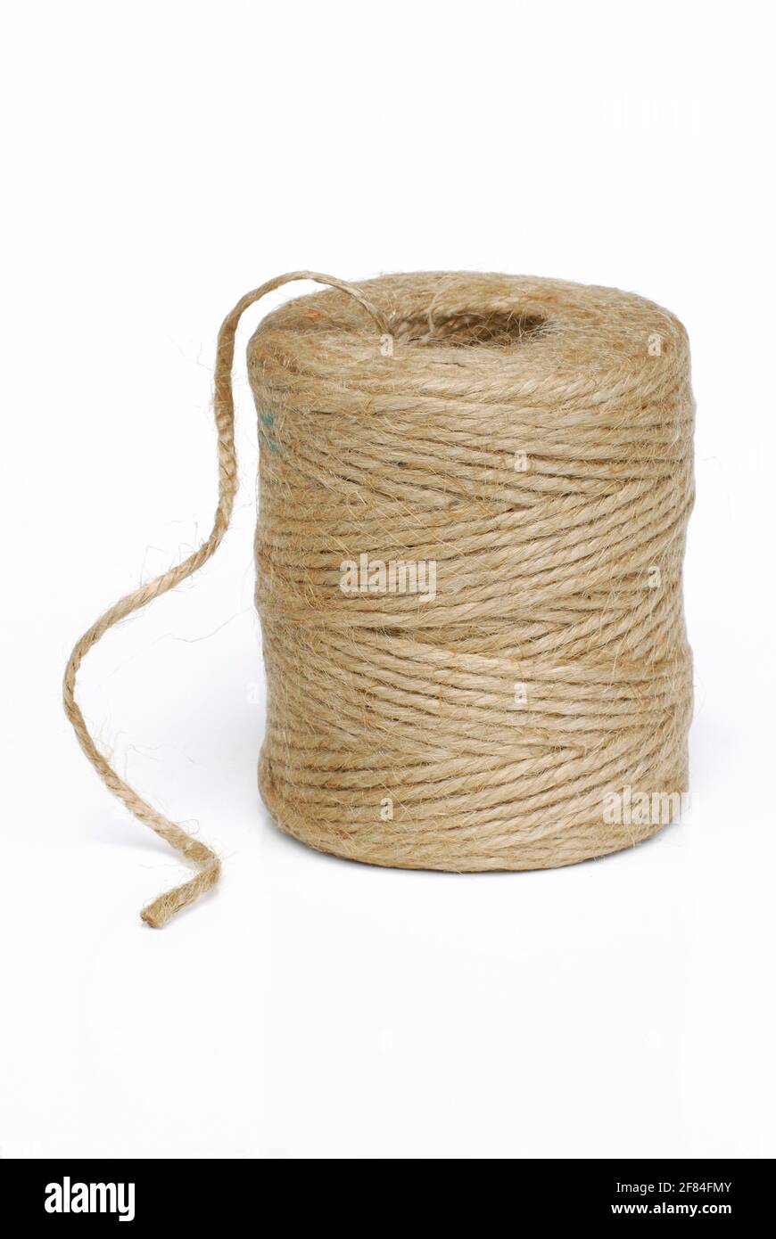 Roll of jute string, jute thread, jute fibre, bast fibre, natural fibre, yarn, cord, plant fibre Stock Photo