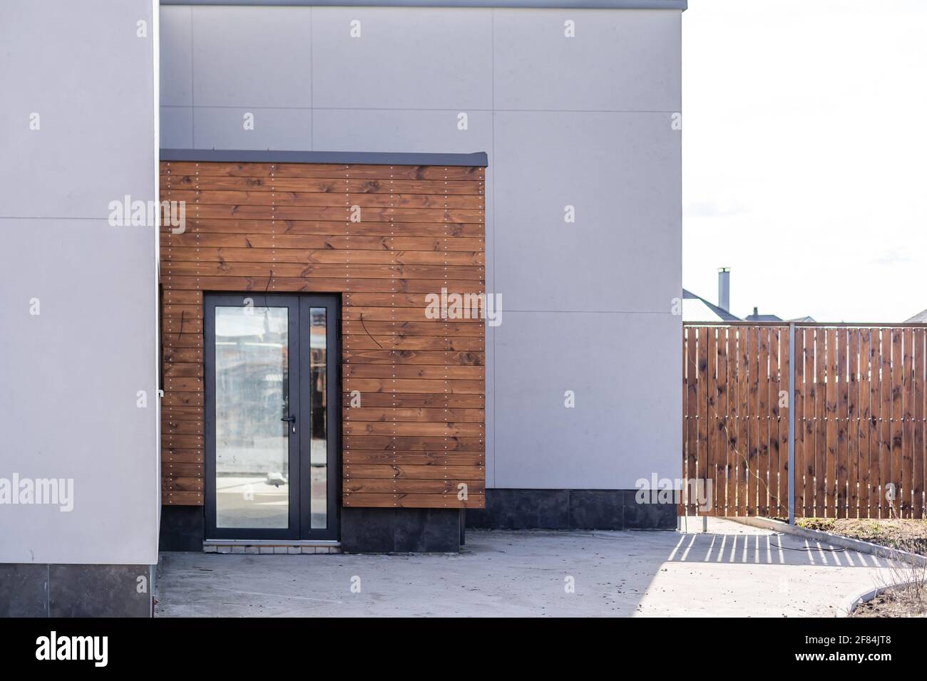 Front door of newly built house closeup Stock Photo - Alamy