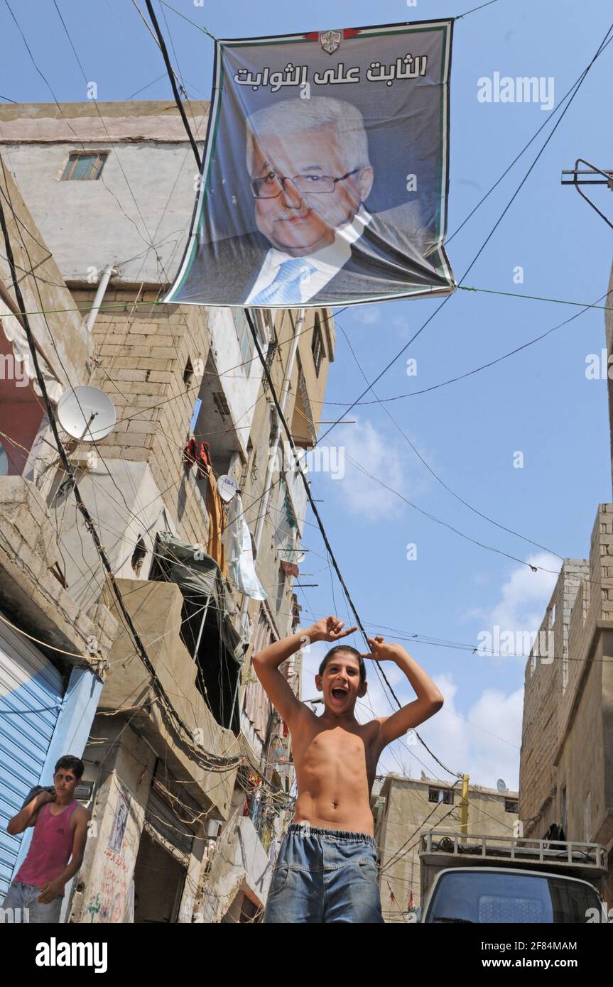 Politics and religios paroles on posters in the palestinian refugie camp Schatila in Beirut. Politische und religiöse Botschaften auf Posters im paläs Stock Photo