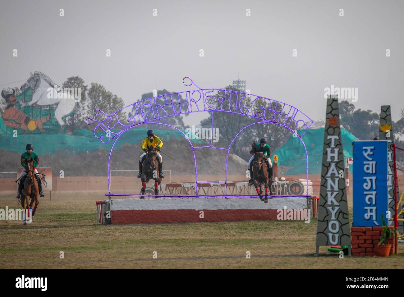 Nepali mounted soldiers perform horse jumping as they takes part in the