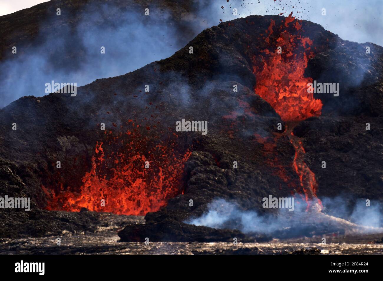 Detail of two craters erupting lava, Fagradalsfjall volcano, Iceland ...