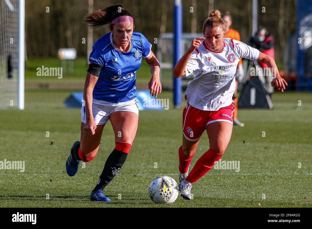 Glasgow, UK. 11th Apr, 2021. Kirsten Reilly (#8) of Rangers Women FC & Michaela McAlonie (#7) of Spartans FC Women chase a loose ball during the Scottish Building Society SWPL1 Fixture Rangers FC vs Spartans FC at Rangers Training Centre, Glasgow, 11/04/2021 | Images courtesy of www.collargeimages.co.uk Credit: Colin Poultney/Alamy Live News Stock Photo