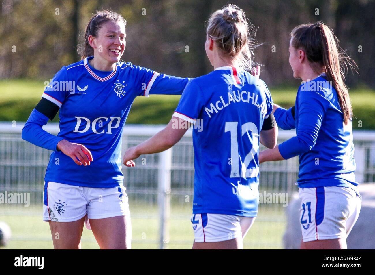 Glasgow, UK. 11th Apr, 2021. GOAL! Lizzie Arnot (#15) of Rangers Women FC celebrates with team mates Rachel McLauchlan (#12) & Kirsty Howart (#21) during the Scottish Building Society SWPL1 Fixture Rangers FC vs Spartans FC at Rangers Training Centre, Glasgow, 11/04/2021 | Images courtesy of www.collargeimages.co.uk Credit: Colin Poultney/Alamy Live News Stock Photo
