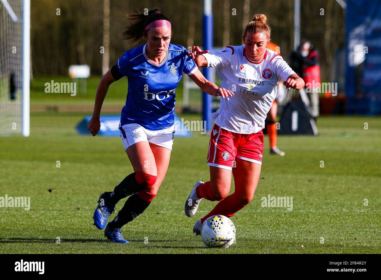 Glasgow, UK. 11th Apr, 2021. Kirsten Reilly (#8) of Rangers Women FC & Michaela McAlonie (#7) of Spartans FC Women chase a loose ball during the Scottish Building Society SWPL1 Fixture Rangers FC vs Spartans FC at Rangers Training Centre, Glasgow, 11/04/2021 | Images courtesy of www.collargeimages.co.uk Credit: Colin Poultney/Alamy Live News Stock Photo