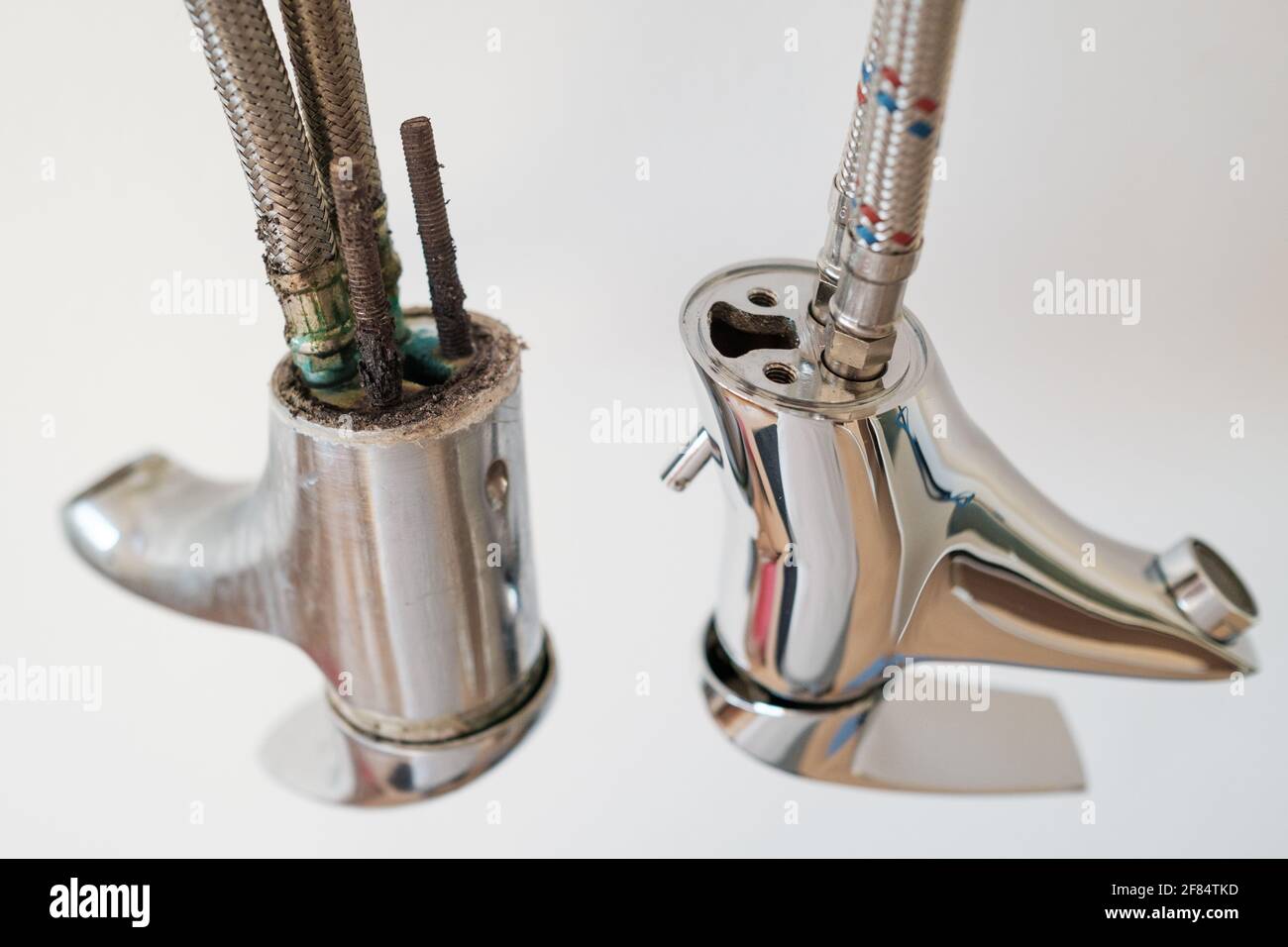 A new and an old faucet or water tap with deposited minerals on the