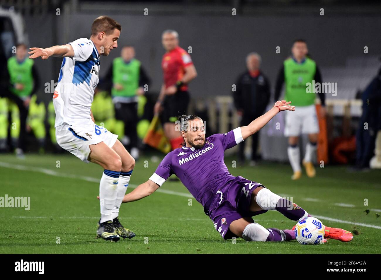 Florence, Italy. 11th Apr, 2021. Mario Pasalic of Atalanta BC and Martin Caceres of ACF Fiorentina compete for the ball during the Serie A football match between ACF Fiorentina and Atalanta Bergamasca Calcio at Artemio Franchi stadium in Firenze (Italy), April 11th, 2021. Photo Andrea Staccioli/Insidefoto Credit: insidefoto srl/Alamy Live News Stock Photo