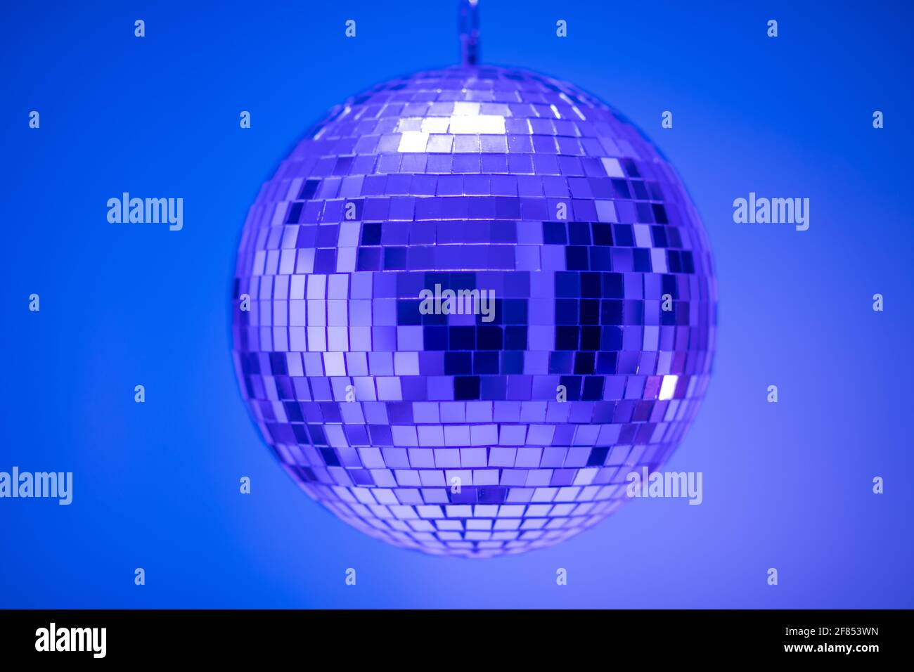 disco balls for decorationof a party on pink background Stock Photo - Alamy