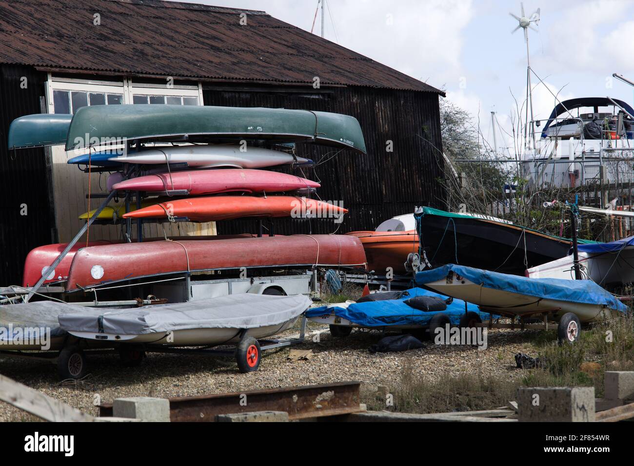 View of a coastal boatyard, Tollesbury, Essex, Britain, April 2021