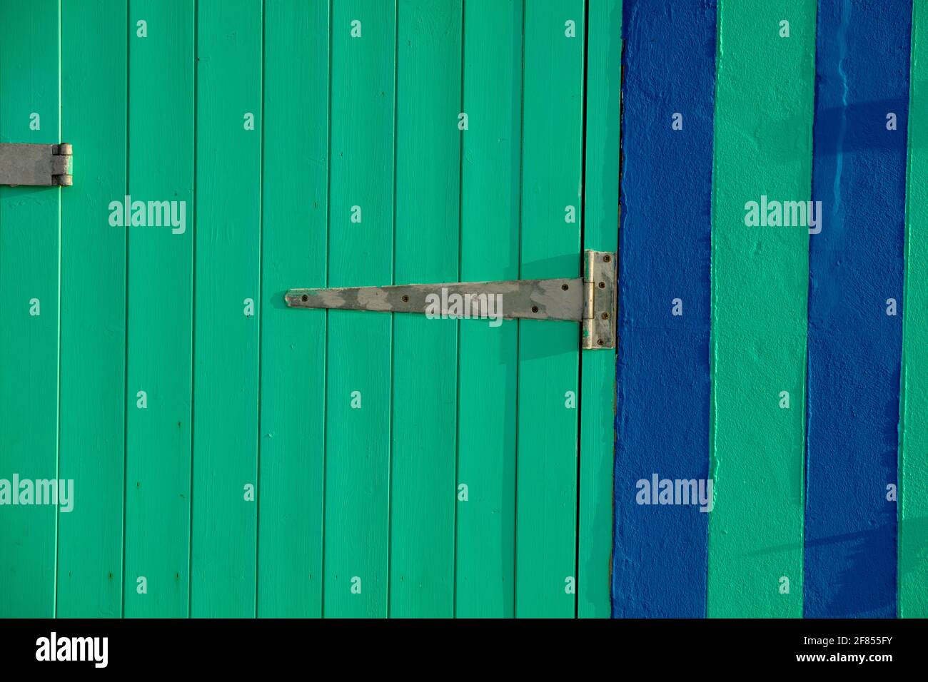 Green painted wooden door. Stock Photo