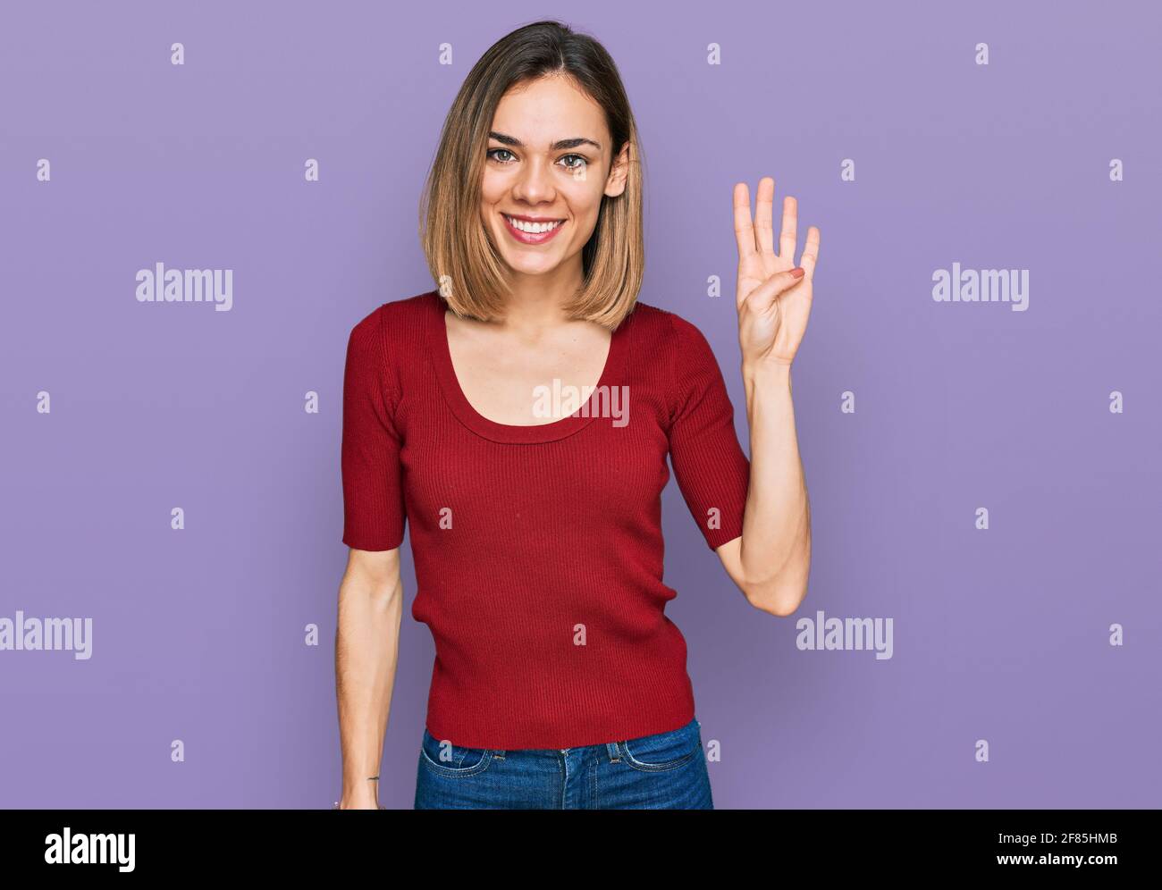 young-blonde-girl-wearing-casual-clothes-showing-and-pointing-up-with