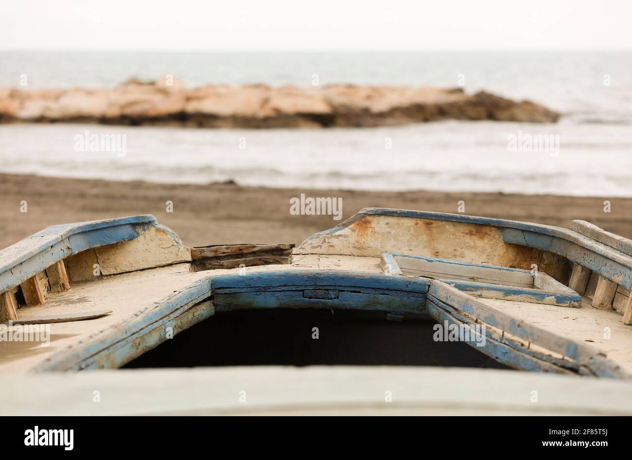 old fishing boat stranded on the sand Stock Photo - Alamy