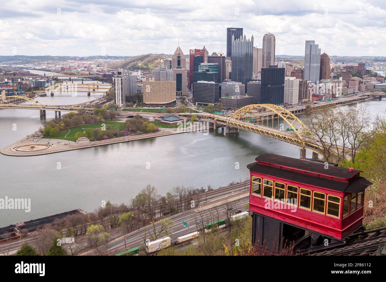 A cable car from the Duquesne Incline with downtown Pittsburgh, Pennsylvania, USA in the background Stock Photo