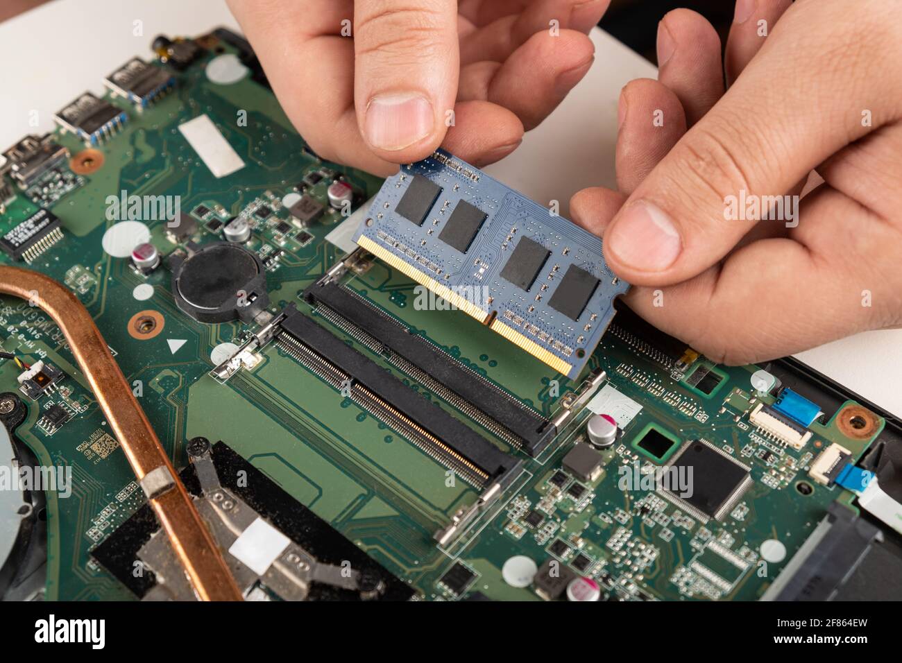 installing RAM in a laptop,improve laptop performance Stock Photo