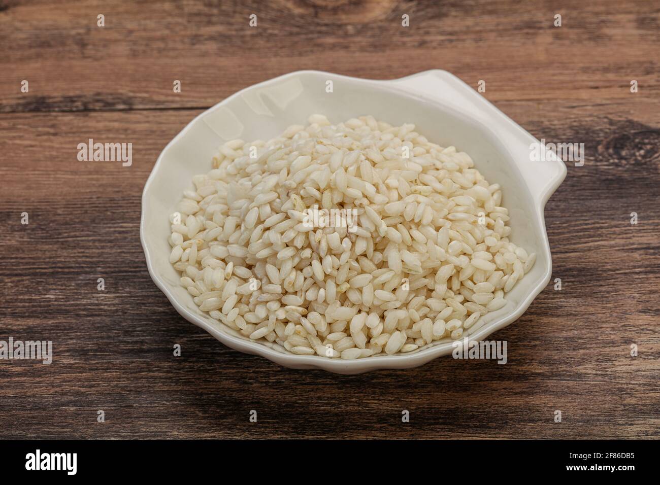 Raw Italian arborio rice for Risotto Stock Photo - Alamy