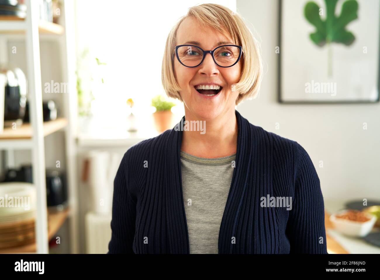 Happy senior woman eyeglasses hi-res stock photography and images - Alamy