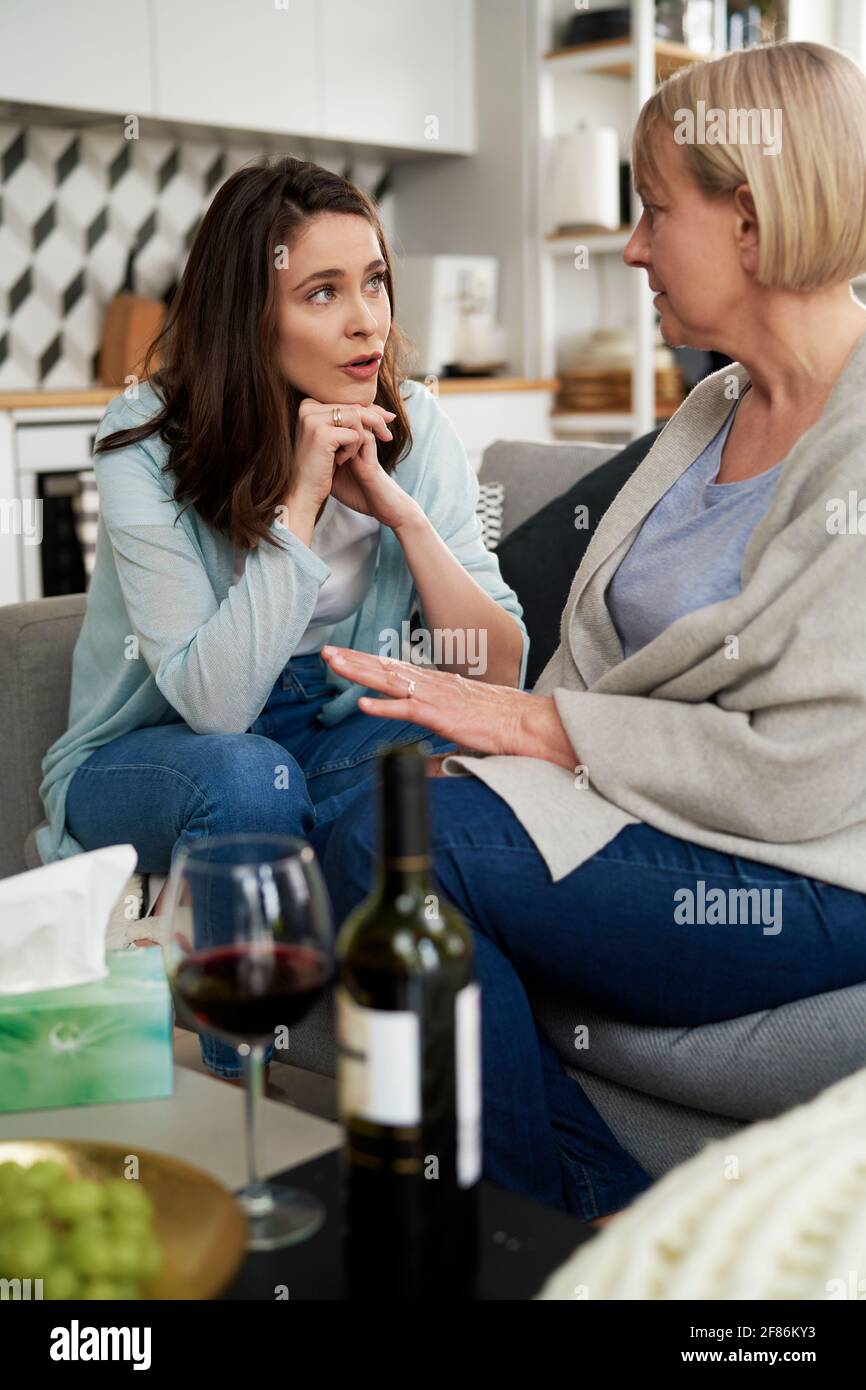 Two generation women talking at home Stock Photo