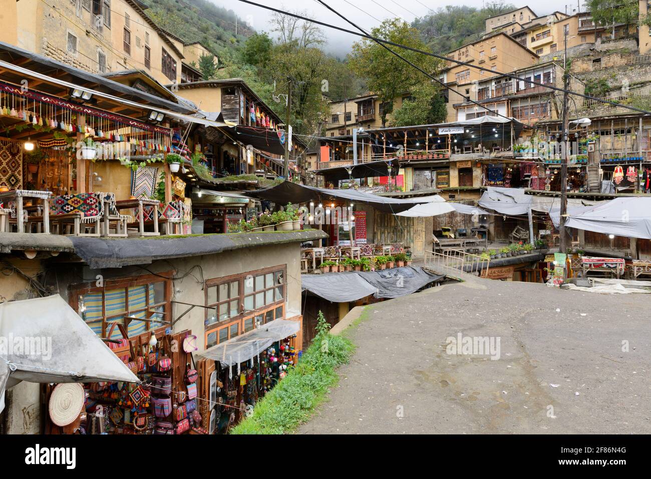 A collection of café's on the roofs of underlying houses in the historical village Masuleh, Gilan Province, Iran Stock Photo