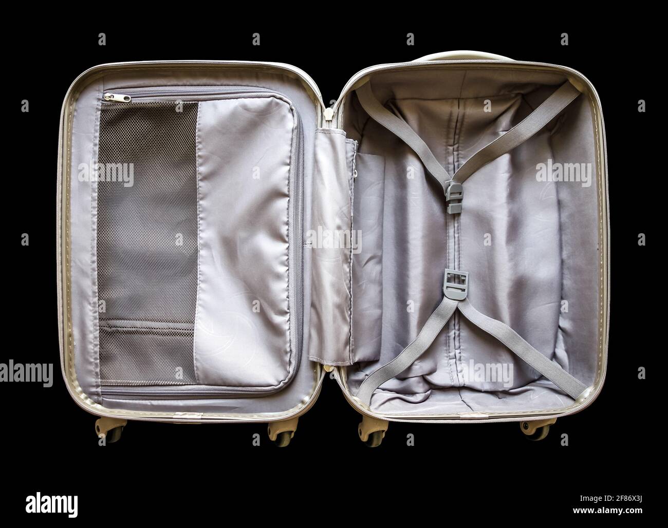 Open travel modern suitcase isolated on black background Stock Photo