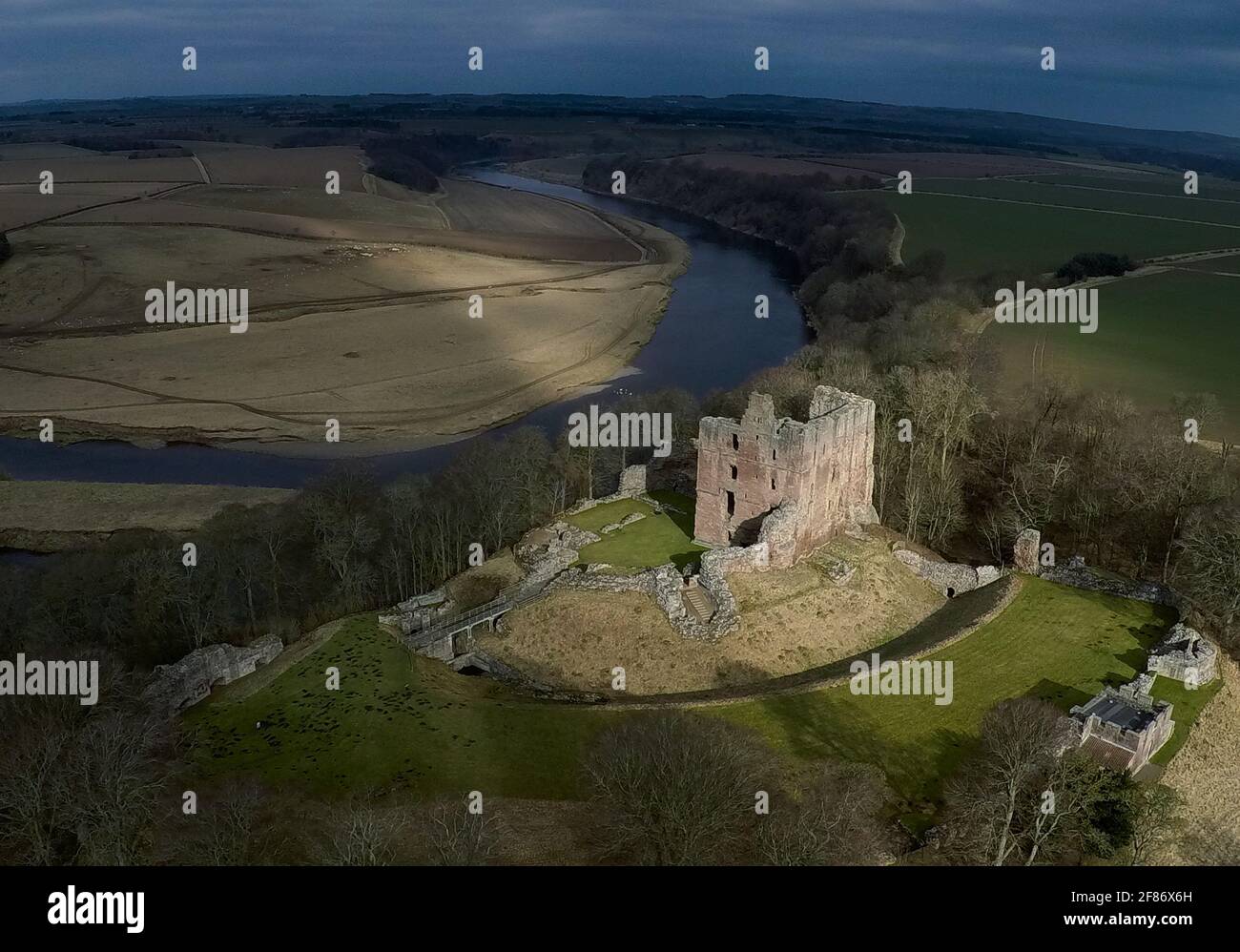 Norham Castle one of the most important of the Border castles was built in 1121 by the Bishops of Durham a long and turbulent history saw many famous Stock Photo