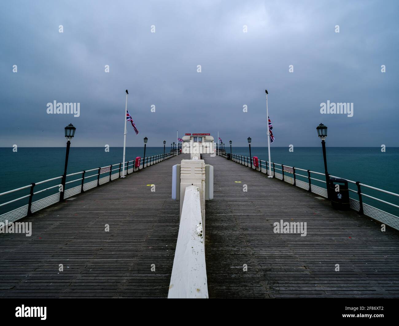 Worthing pier flags at half mast hires stock photography and images