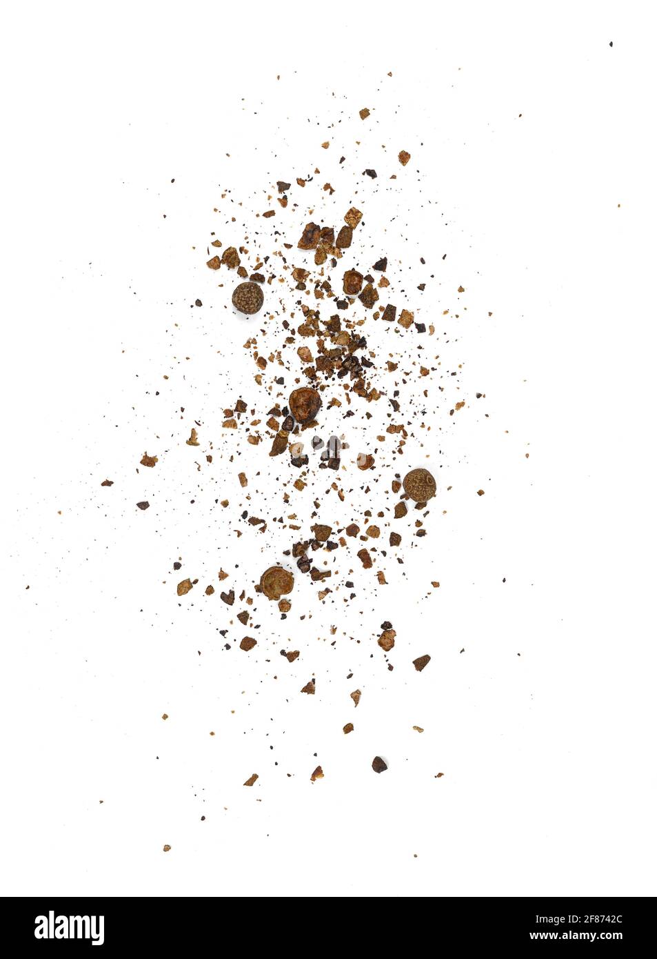 Ground Allspice, crushed pimento spice, Jamaican pepper pile isolated