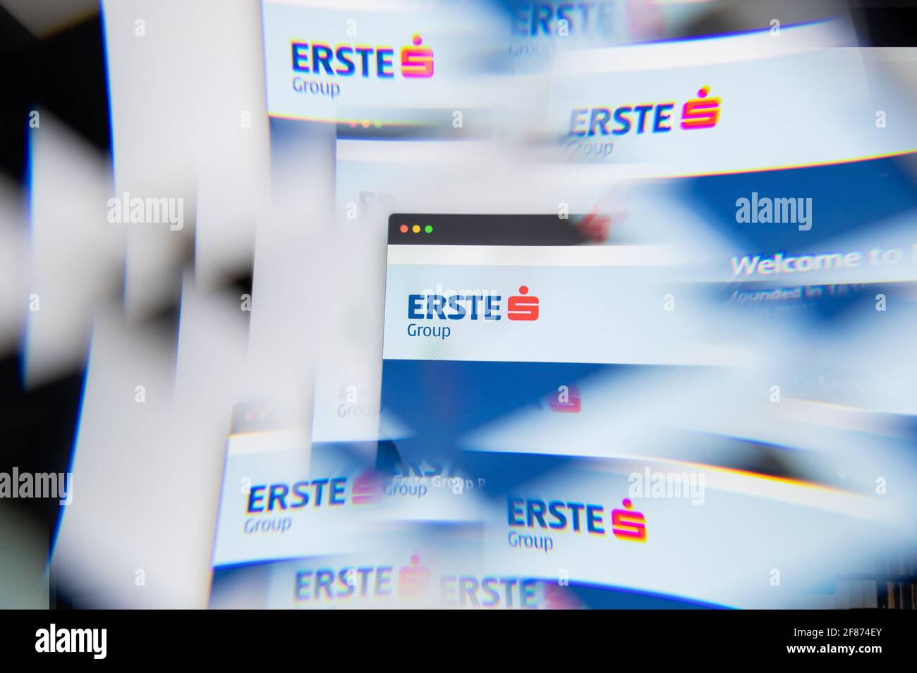Milan, Italy - APRIL 10, 2021: Erste Bank logo on laptop screen seen through an optical prism. Illustrative editorial image from Erste Bank website. Stock Photo