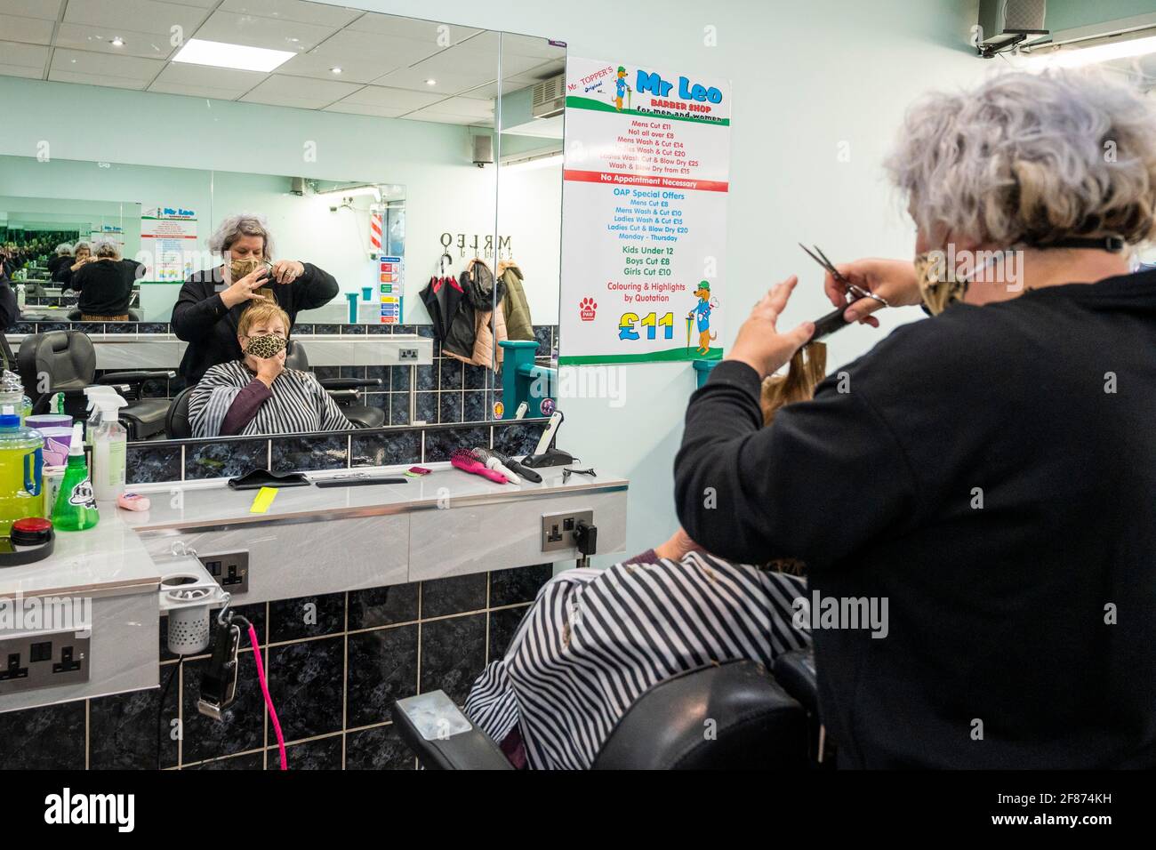 Brighton UK 12th April 2021 Hairdressers back in action at Mr Leo