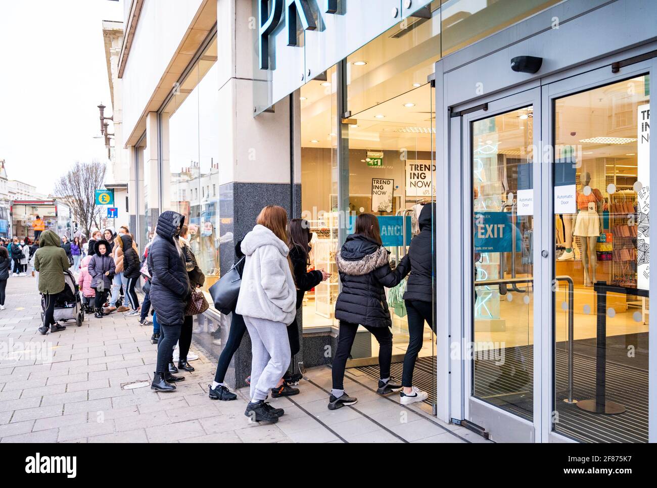 Brighton, UK. 12th Apr, 2021. The first customers enter the Primark store in Western Road Brighton early this morning as the next stage of lockdown easing begins in England : Credit: Simon Dack/Alamy Live News Stock Photo