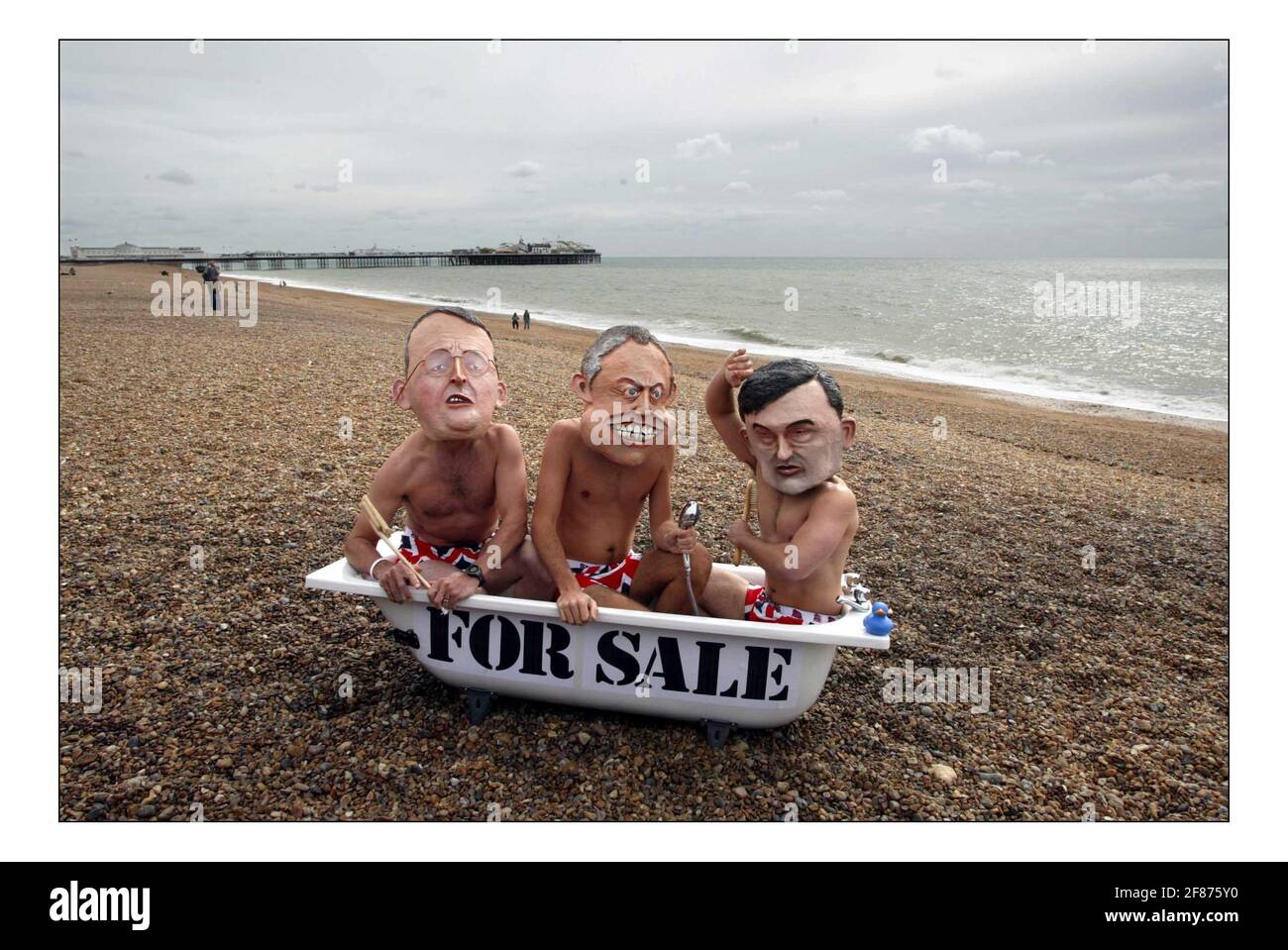 Blair Brown and Benn take a bath in protest against UK support for water privatisation in Third World at labour party conf brightonpic David Sandison 28/9/2005 Stock Photo