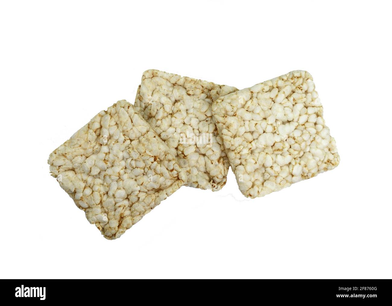 Puffed rice cakes isolated on white. Stack of puffed whole grain