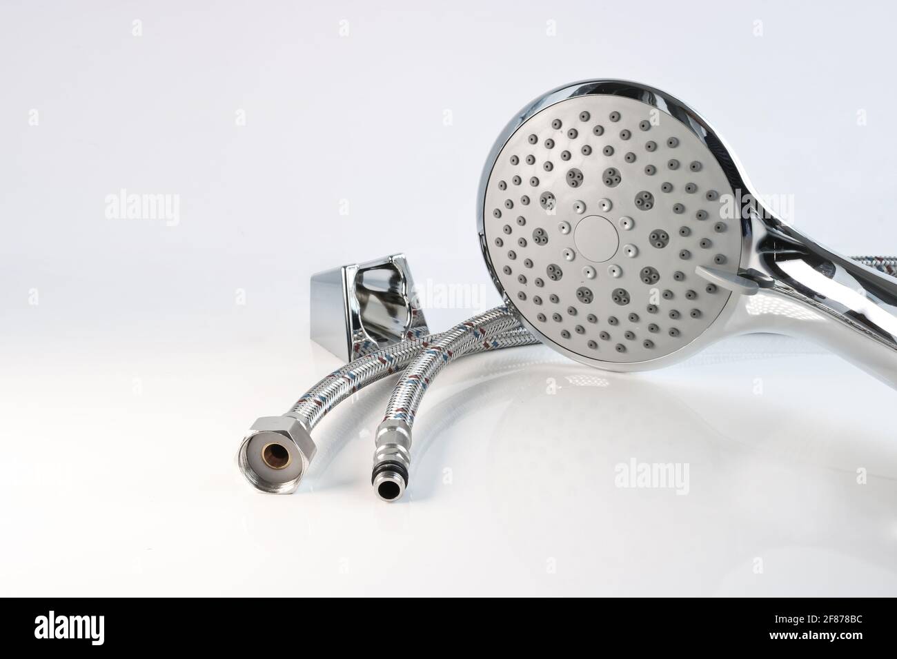 Shower head, wall mount and flexible water connections on a light