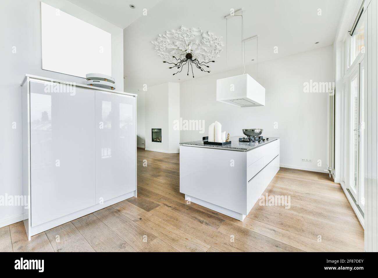 Light kitchen with contemporary furniture Stock Photo - Alamy