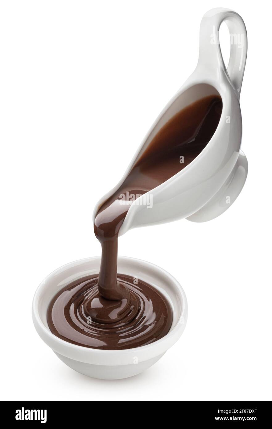 Pouring melted chocolate isolated on white background Stock Photo