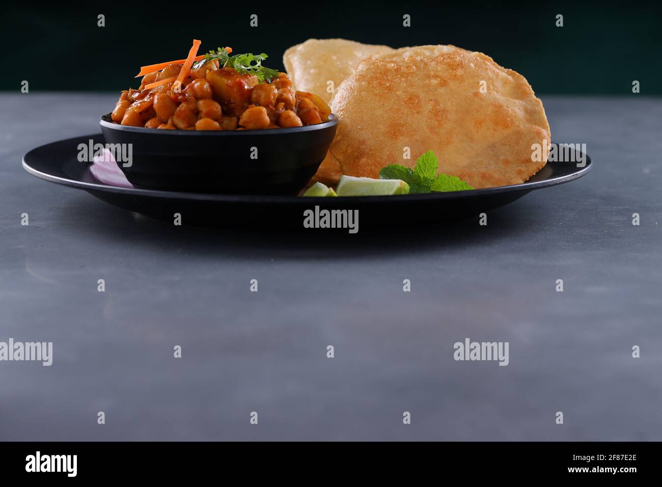 Indian breakfast Poori with chickpea chana masala curry,tasty indian